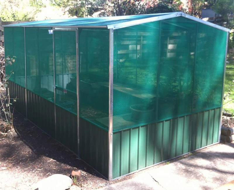 Image of an outdoor garden shed in a backyard